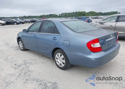 2002 Toyota Camry Le z USA, uszkodzony, nr VIN 4T1BE32K22U573578
